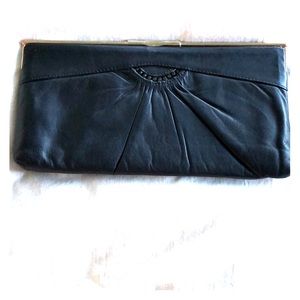 Vintage blue leather clutch.